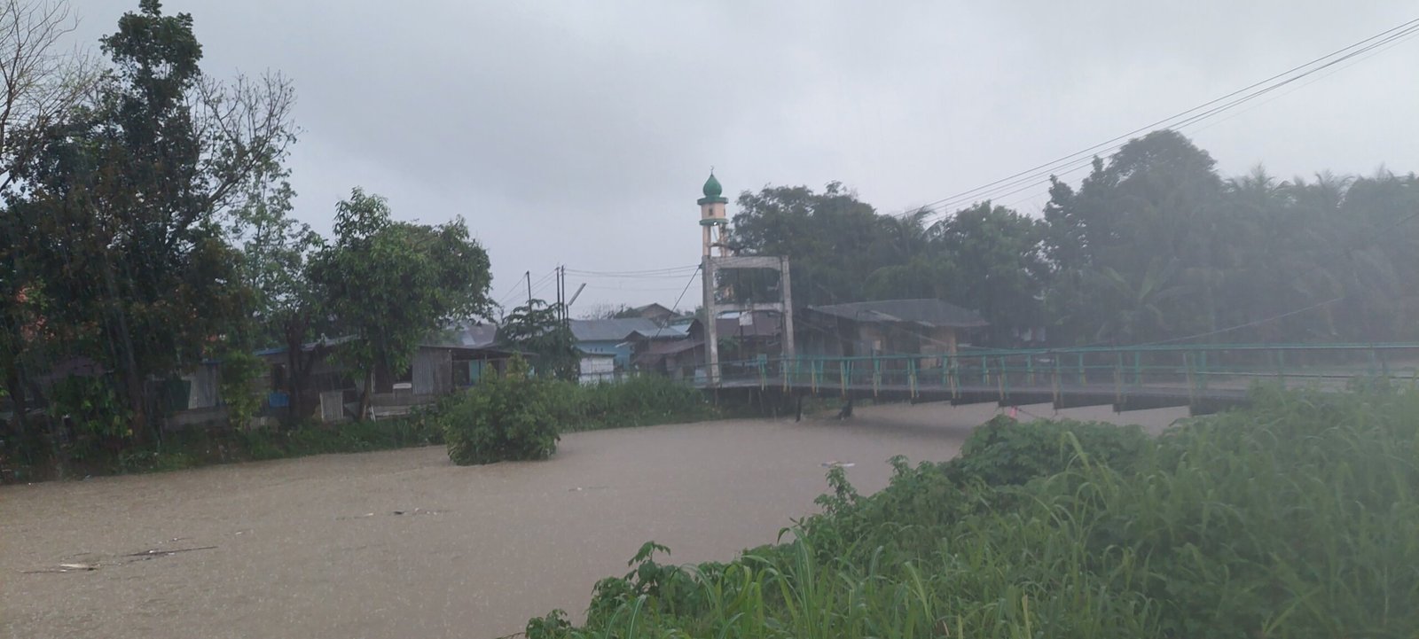 Hujan Deras Mengakibatkan Rumah Warga Terendam Banjir