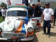 Oplet Tua Milik Mantan Bupati Sergai Soekirman Ikut Arak-Arakan Sambut Capres 01 Anies Di Bandara Kualanamu