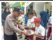 Polres Sergai Kawal Peninjauan Perdana Program Makan Bergizi Gratis di SD Negeri Kota Pari